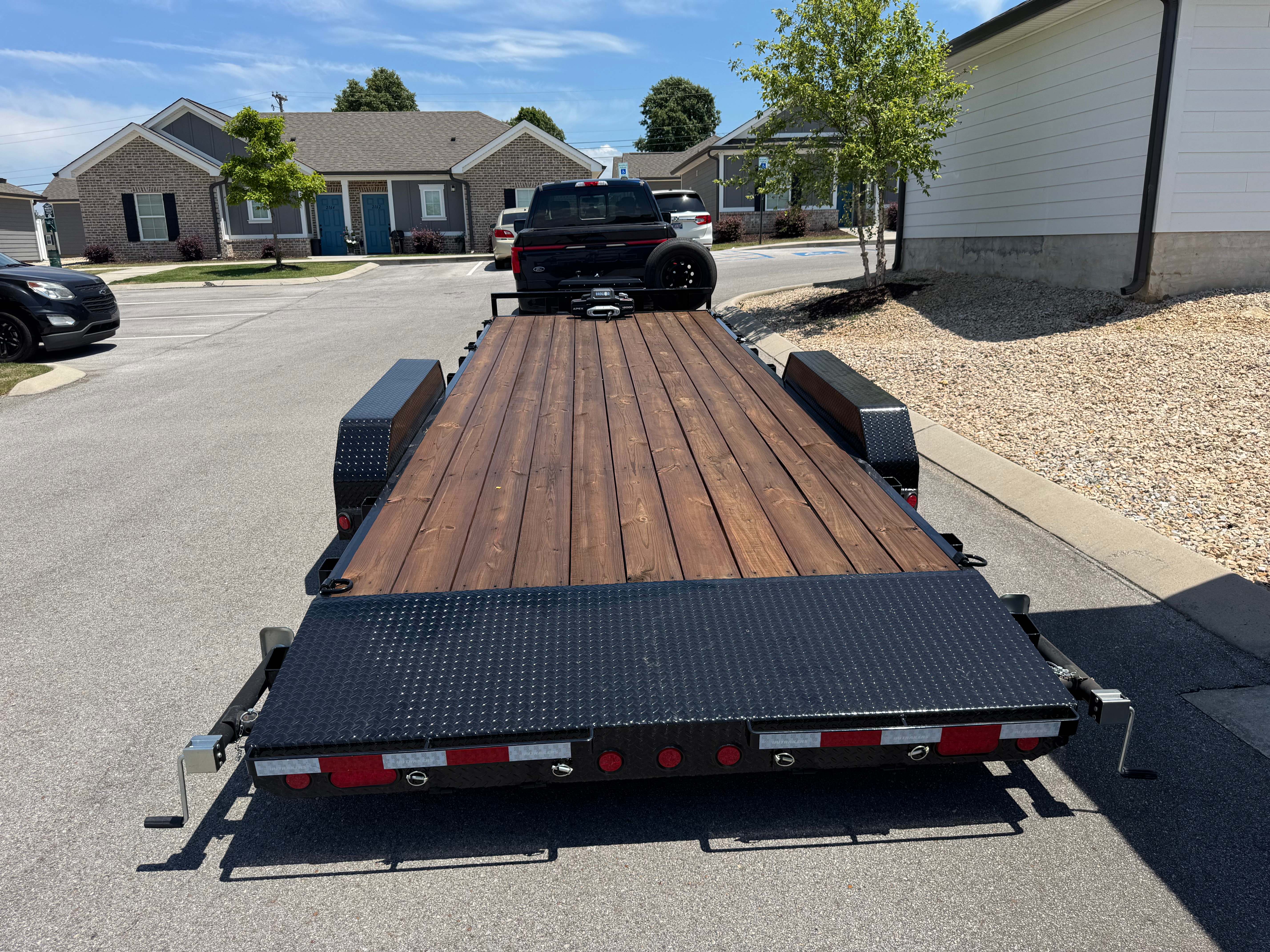 22ft flatbed car hauler trailer loaded with a vehicle